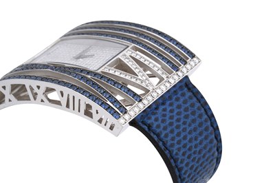 Lot 8 - A CHOPARD 'MONTRE DAME XL' 18CT WHITE GOLD, SAPPHIRE AND DIAMOND LADIES WRISTWATCH