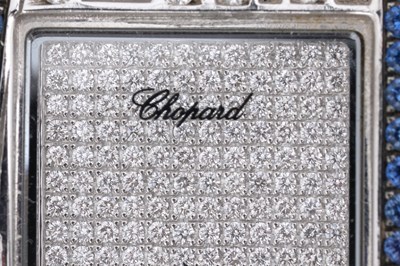 Lot 8 - A CHOPARD 'MONTRE DAME XL' 18CT WHITE GOLD, SAPPHIRE AND DIAMOND LADIES WRISTWATCH