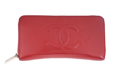 Lot 141 - A CHANEL LIPSTICK RED CAVIAR LEATHER ZIP-AROUND WALLET
