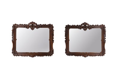 Lot 75 - A PAIR OF BLACK FOREST STYLE CARVED WALL MIRRORS