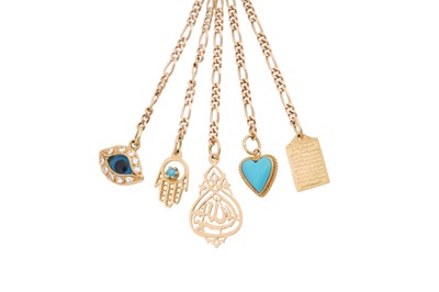 Lot 59 - AN 18CT GOLD CHARM KEYCHAIN