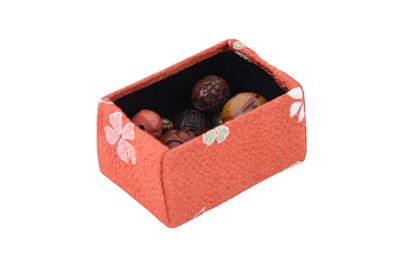 Lot 59 - λ A GROUP OF FOURTEEN JAPANESE OJIME BEADS