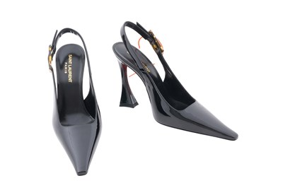 Lot 111 - A PAIR OF SAINT LAURENT ‘DUNE’ PATENT LEATHER SLINGBACK PUMPS