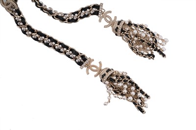 Lot 75 - A BOXED CHANEL CRYSTAL, FAUX PEARL, LEATHER AND GILT METAL TASSEL NECKLACE