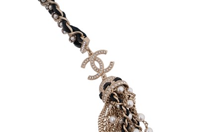 Lot 75 - A BOXED CHANEL CRYSTAL, FAUX PEARL, LEATHER AND GILT METAL TASSEL NECKLACE