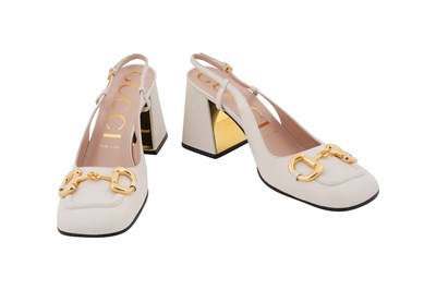 Lot 112 - A GUCCI CREAM LEATHER HORSEBIT SLINGBACK COURT SHOES WITH BLOCK HEELS
