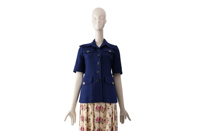 Lot 101 - A GUCCI COBALT BLUE WOOL SHORT-SLEEVED JACKET