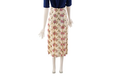 Lot 76 - A GUCCI FLORAL SILK PLEATED SKIRT WITH TAGS