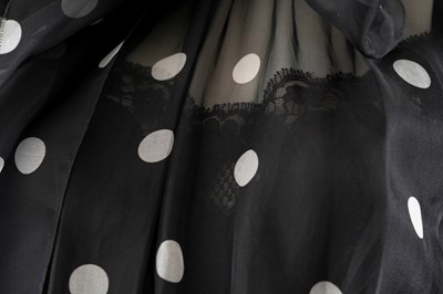 Lot 96 - A DOLCE & GABBANA BLACK POLKA DOT SILK CHIFFON DRESS