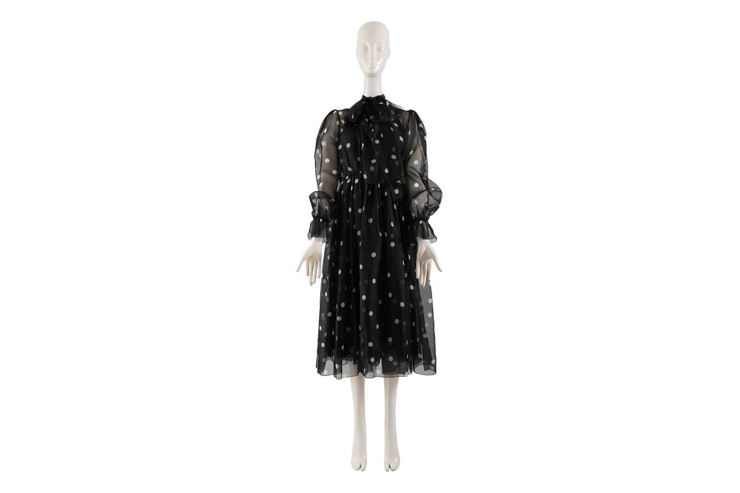 Lot 96 - A DOLCE & GABBANA BLACK POLKA DOT SILK CHIFFON DRESS