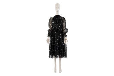Lot 96 - A DOLCE & GABBANA BLACK POLKA DOT SILK CHIFFON DRESS