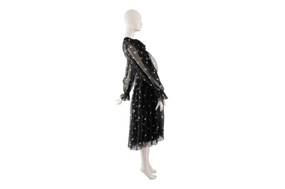 Lot 96 - A DOLCE & GABBANA BLACK POLKA DOT SILK CHIFFON DRESS