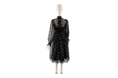 Lot 96 - A DOLCE & GABBANA BLACK POLKA DOT SILK CHIFFON DRESS