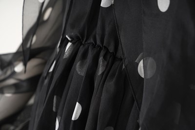 Lot 96 - A DOLCE & GABBANA BLACK POLKA DOT SILK CHIFFON DRESS