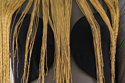 Lot 82 - AN ELISABETTA FRANCHI BLACK WITH GOLD FRINGE EMBELLISHED SHEER BODYSUIT