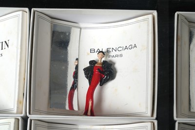 Lot 170 - A COLLECTION OF 16 PIXI 'MODE: LA HAUTE COUTURE' MINIATURE FASHION DESIGNER FIGURINES IN DISPLAY BOX