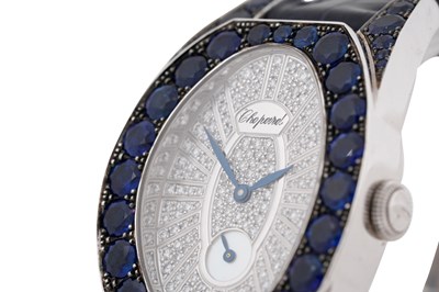 Lot 10 - A CHOPARD 'CLASSIQUE FEMME' 18CT WHITE GOLD SAPPHIRE AND DIAMOND LADIES WRISTWATCH