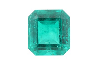 Lot 54 - AN UNMOUNTED OCTAGONAL STEP CUT COLOMBIAN EMERALD