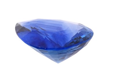 Lot 53 - AN UNMOUNTED PEAR CUT SAPPHIRE