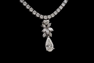 Lot 14 - AN 18CT WHITE GOLD AND DIAMOND TENNIS NECKLACE WITH PENDANT