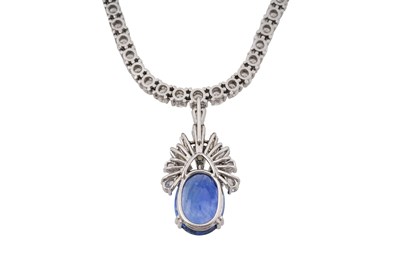 Lot 15 - AN 18CT WHITE GOLD DIAMOND TENNIS NECKLACE WITH AN ART DECO STYLE DIAMOND AND SAPPHIRE PENDANT