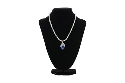 Lot 15 - AN 18CT WHITE GOLD DIAMOND TENNIS NECKLACE WITH AN ART DECO STYLE DIAMOND AND SAPPHIRE PENDANT