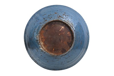Lot 17 - A SWATOW WARE BLUE-GROUND SLIP-DECORATED CHARGER