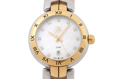 Lot 11 - A TAG HEUER LADIES LINK 18CT GOLD AND STEEL BRACELET WATCH