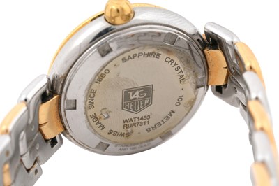 Lot 11 - A TAG HEUER LADIES LINK 18CT GOLD AND STEEL BRACELET WATCH