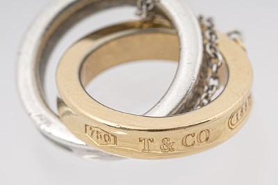 Lot 25 - A TIFFANY & CO. STERLING SILVER AND 18CT ROSE GOLD 'INTERLOCKING CIRCLES' PENDANT NECKLACE