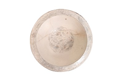 Lot 10 - A CIZHOU WARE CARVED 'PEONY' BOWL