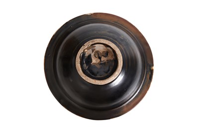 Lot 10 - A CIZHOU WARE CARVED 'PEONY' BOWL
