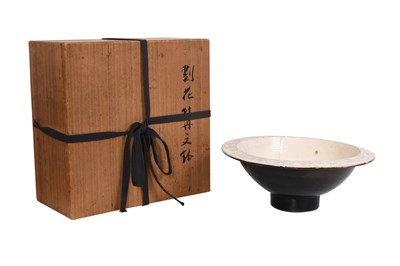 Lot 10 - A CIZHOU WARE CARVED 'PEONY' BOWL