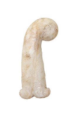 Lot 92 - A CARVED WHITE HARDSTONE PISTOL-GRIP DAGGER HILT
