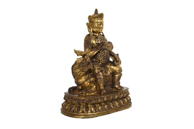 Lot 46 - A GILT LACQUERED BRONZE FIGURE OF LOKAPALA