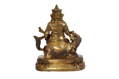Lot 46 - A GILT LACQUERED BRONZE FIGURE OF LOKAPALA