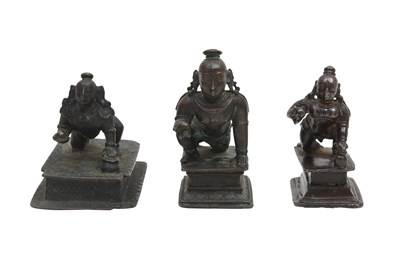 Lot 67 - THREE BRONZE DEVOTIONAL MINIATURE ICONS OF BALA KRISHNA