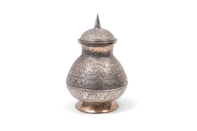 Lot 252 - AN ENGRAVED AND CHASED MALAY SILVER CEREMONIAL WATER JUG