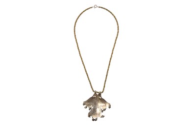 Lot 54 - A HIGH-TIN WHITE METAL ENCRUSTED PENDANT WITH DOUBLE-HEADED EAGLE