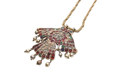 Lot 54 - A HIGH-TIN WHITE METAL ENCRUSTED PENDANT WITH DOUBLE-HEADED EAGLE