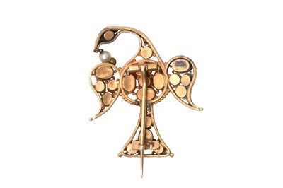 Lot 55 - A GILT RUBY-SET EAGLE BROOCH