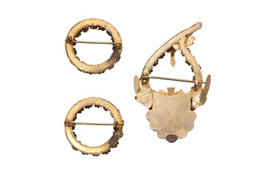 Lot 57 - THREE PARCEL-GILT BROOCHES WITH DOVES AND ROSES