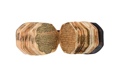 Lot 123 - AN ILLUMINATED OCTAGONAL MINIATURE QUR'AN