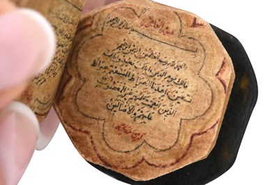Lot 123 - AN ILLUMINATED OCTAGONAL MINIATURE QUR'AN
