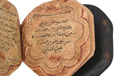 Lot 123 - AN ILLUMINATED OCTAGONAL MINIATURE QUR'AN