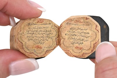 Lot 123 - AN ILLUMINATED OCTAGONAL MINIATURE QUR'AN