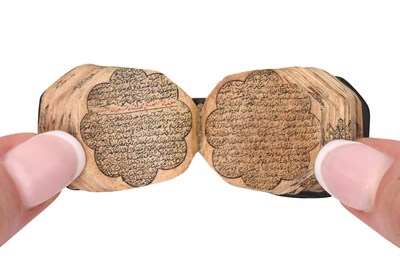Lot 123 - AN ILLUMINATED OCTAGONAL MINIATURE QUR'AN