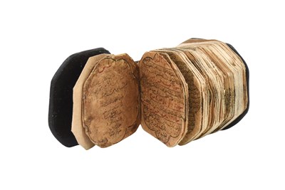 Lot 123 - AN ILLUMINATED OCTAGONAL MINIATURE QUR'AN