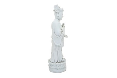 Lot 21 - A LARGE BLANC DE CHINE DEHUA FIGURE OF AN OFFICIAL