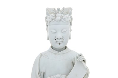 Lot 21 - A LARGE BLANC DE CHINE DEHUA FIGURE OF AN OFFICIAL